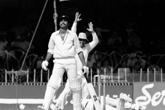 Dilip Vengsarkar of India is caught for 17 runs by Pakistan wicketkeeper Wasim Bari off the bowling of Mudassar Nazar (not in picture) during the 2nd Test match between Pakistan and India at Gaddafi Stadium, Lahore, Pakistan, 1st November 1978. The other fielder for Pakistan is Majid Khan. Pakistan won the match by 8 wickets. (Photo by Patrick Eagar/Popperfoto via Getty Images)