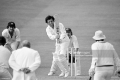 Asif Iqbal of Pakistan batting during his innings of 53 runs in the Prudential World Cup group match between Australia and Pakistan at Headingley, Leeds, 7th June 1975. The fielders for Australia are Ian Chappell and wicketkeeper Rodney Marsh; the non-striking batsman for Pakistan is Majid Khan and the umpire is Bill Alley. Australia won the match by 73 runs. (Photo by Patrick Eagar/Popperfoto via Getty Images)