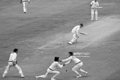 An edge from England batsman Keith Fletcher is dropped in the slips by Shafiq Ahmed and Majid Khan (right) during his innings of 67 not out in the 1st Test match between England and Pakistan at Headingley, Leeds, 29th July 1974. The non-striking batsman for England is John Edrich and Pakistan fielders include wicketkeeper Wasim Bari. The match ended in a draw. (Photo by Ken Kelly/Popperfoto via Getty Images/Getty Images)