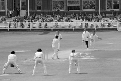 England captain Mike Denness is bowled for 20 runs by Imran Khan of Pakistan during the 2nd Test match between England and Pakistan at Lord's Cricket Ground, London, 9th August 1974. The non-striking batsman for England is John Edrich and the umpire is Charlie Elliott; the fielders for Pakistan are wicketkeeper Wasim Bari, Zaheer Abbas and Majid Khan. The match ended in a draw. (Photo by Patrick Eagar/Popperfoto via Getty Images)