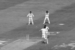 England batsman Tony Greig is run out for 9 runs during the 2nd Test match between England and Pakistan at Lord's Cricket Ground, London, 9th August 1974. The wicketkeeper for Pakistan is Wasim Bari and the fielders are Majid Khan and Zaheer Abbas. The match ended in a draw. (Photo by Ken Kelly/Popperfoto via Getty Images/Getty Images)
