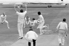 Pakistan batsman Majid Khan is caught behind for 4 runs by England wicketkeeper Alan Knott off the bowling of Geoff Arnold during the 1st Test match between England and Pakistan at Headingley, Leeds, 27th July 1974. The other fielders for England are Tony Greig and Keith Fletcher; the non-striking batsman for Pakistan is Shafiq Ahmed and the umpire is Arthur Fagg. The match ended in a draw. (Photo by Patrick Eagar/Popperfoto via Getty Images)