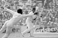 Pakistan batsman Majid Khan gets the ball past a diving Gordon Greenidge of West indies during his innings of 81 runs in the Prudential World Cup Semi Final between Pakistan and West Indies at The Oval, London, 20th June 1979. West Indies won the match by 43 runs. (Photo by Patrick Eagar/Popperfoto via Getty Images)